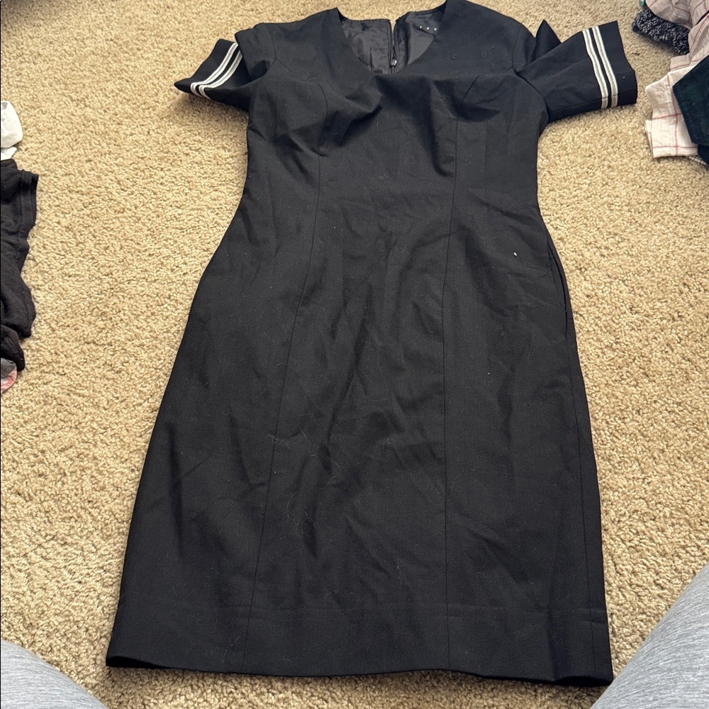 Elegant Black Dress with Striped Sleeves